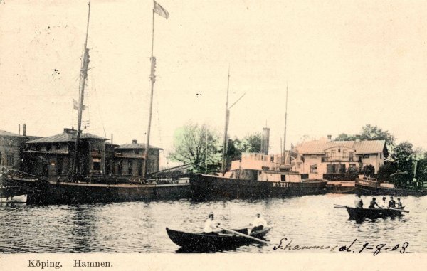 View of the harbour of Köping with the first station building of KUJ to the left, ca 1900